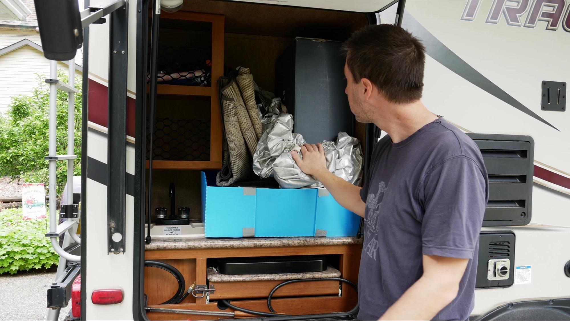 Jay packs out Starlink in the original box and stores it in the outdoor kitchen of our RV. 